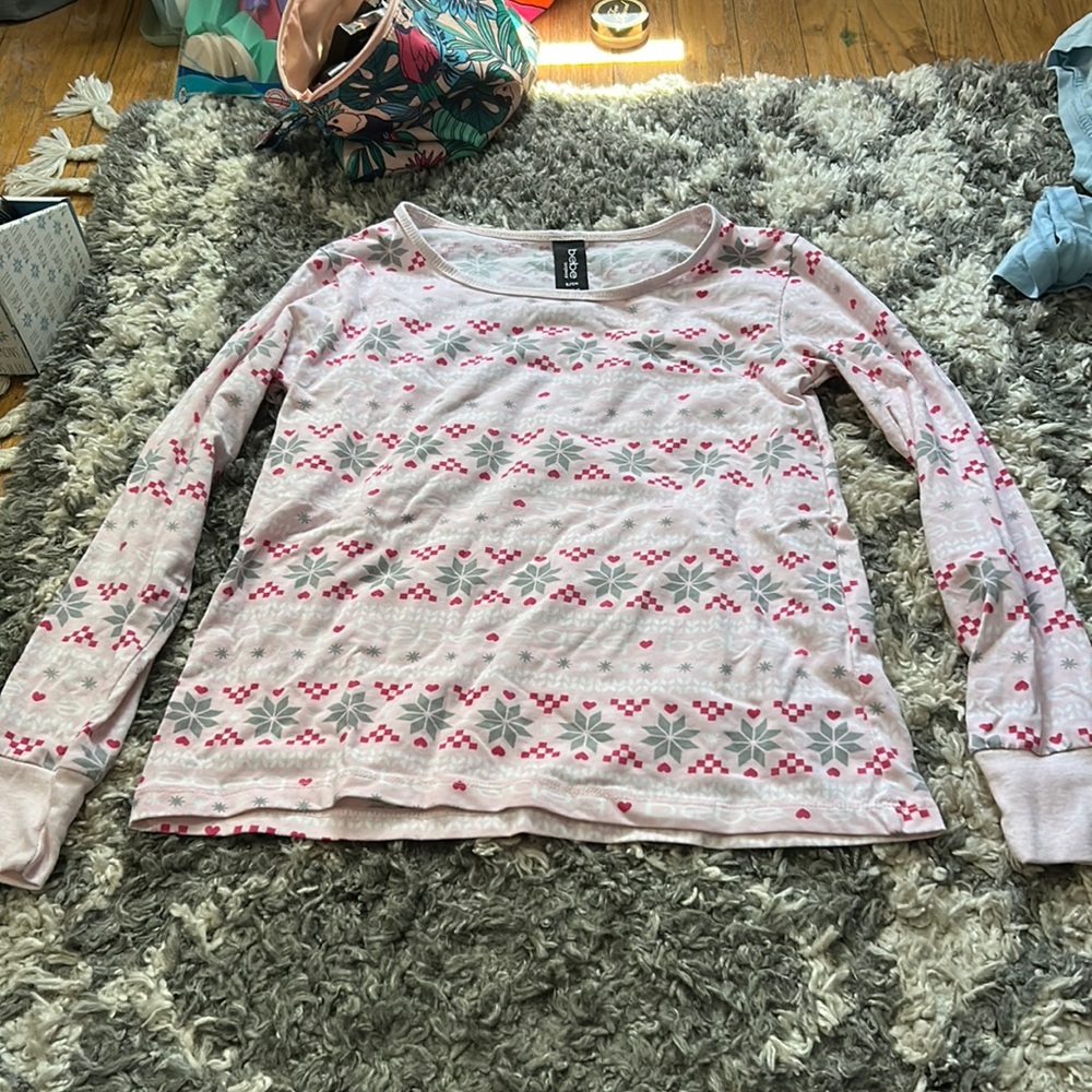 Christmas like pattern with a variety of shades of pink and has some grey